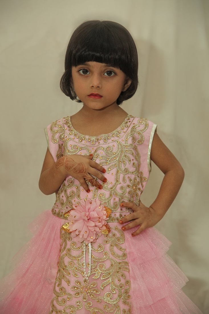 Girls' blue dress manufactured by Faraak, Karachi